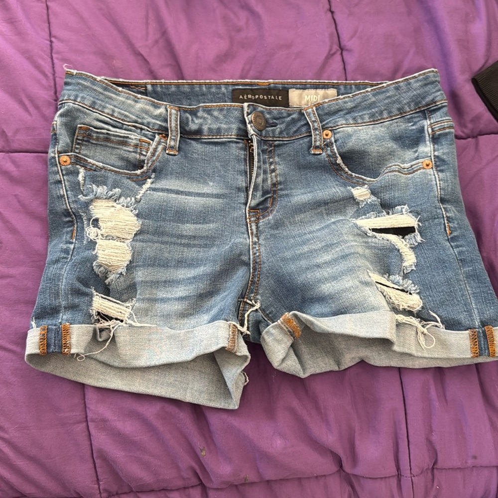 Torn and tattered jeans shorts for summer fun!